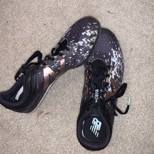 new balance md500 mid distance track spikes